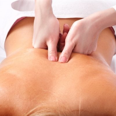 Massage of female back. Health and beauty.